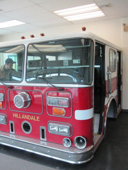 Adam Bradfield helps locate the pumper cab in the MCVFRA Recruitment Office